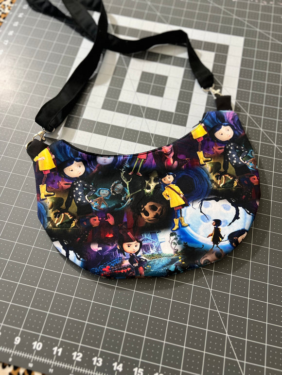 Button Eyed Girl Crescent Crossbody Bag