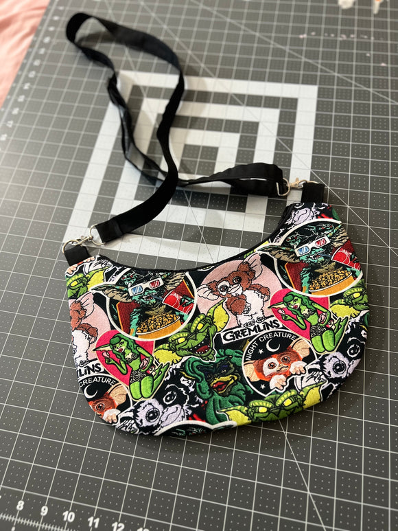 Gre3ml!ns Patch Crescent Crossbody Bag