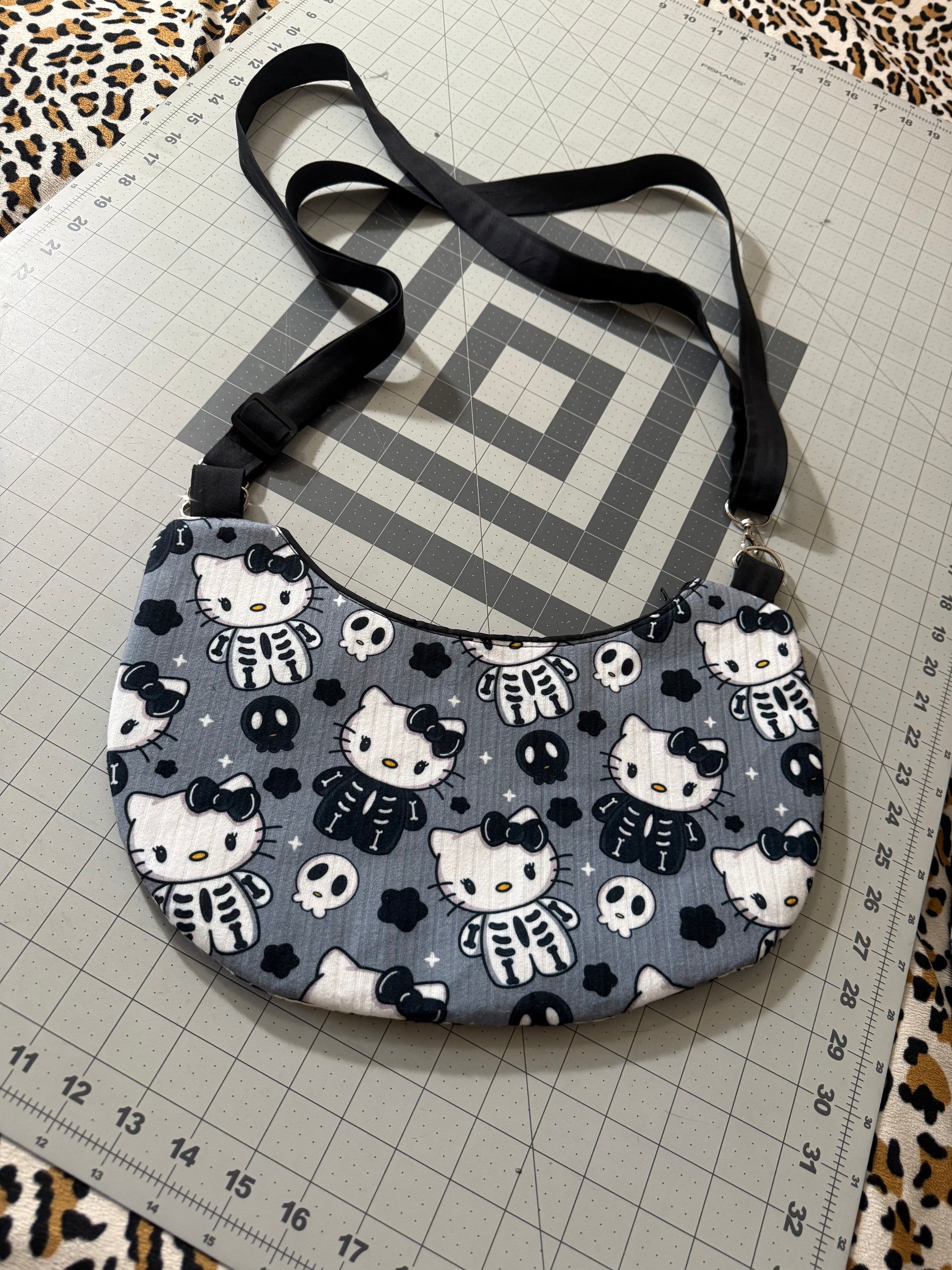 HK Skelly Crescent Crossbody Bag
