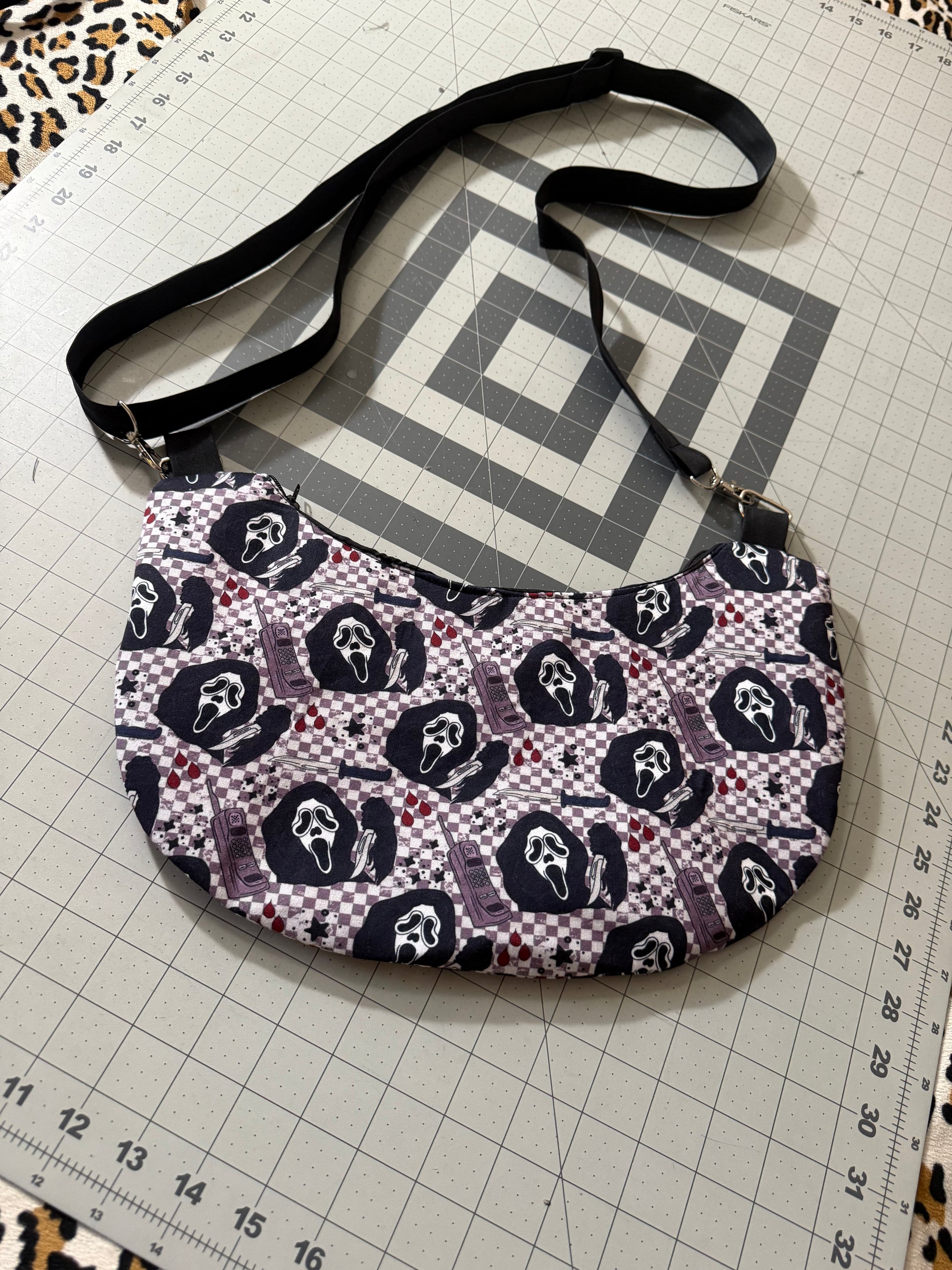 Call Me Checkered Crescent Crossbody Bag